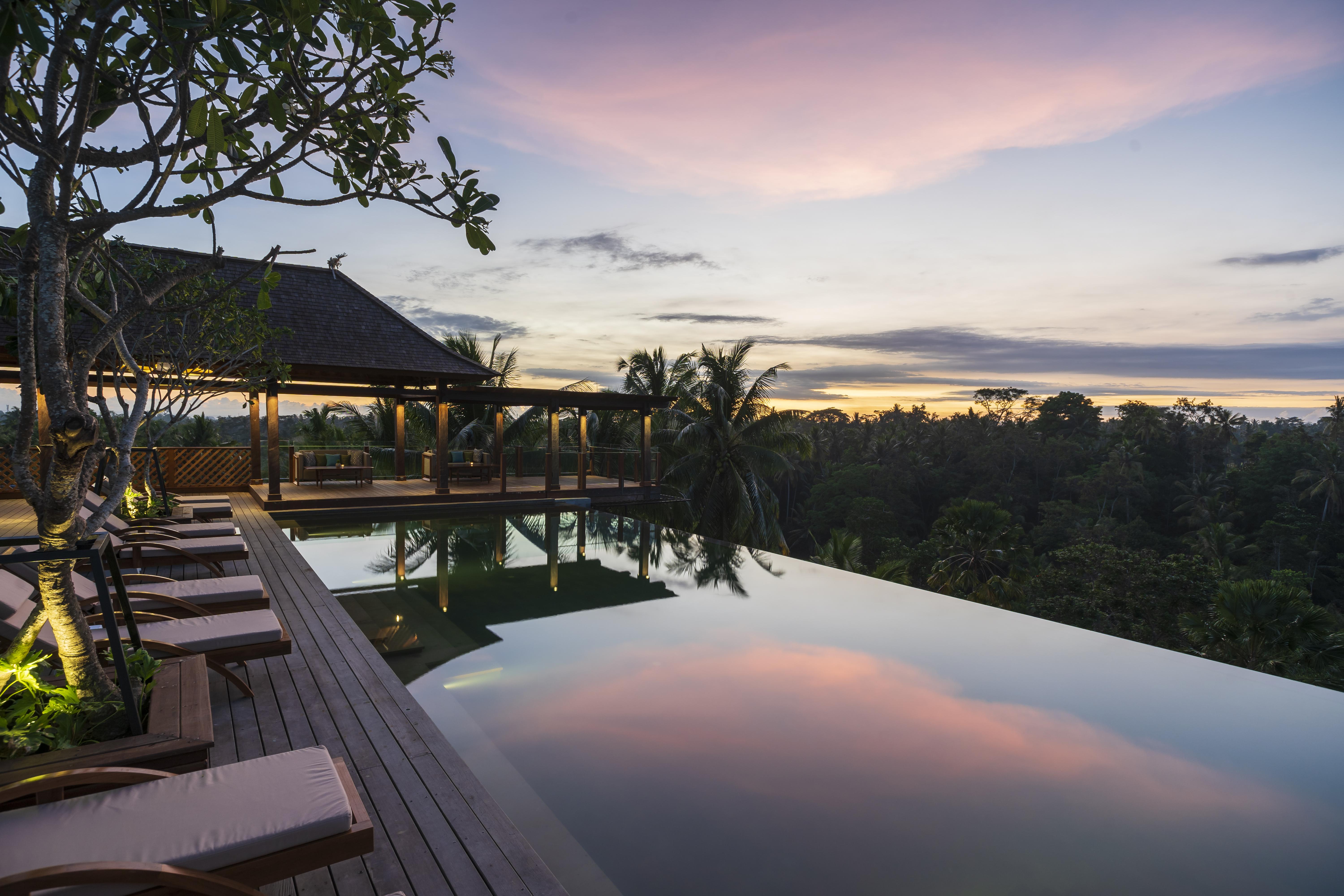 Adiwana Bisma Hotell Ubud Exteriör bild The view from the pool at Alila Ubud