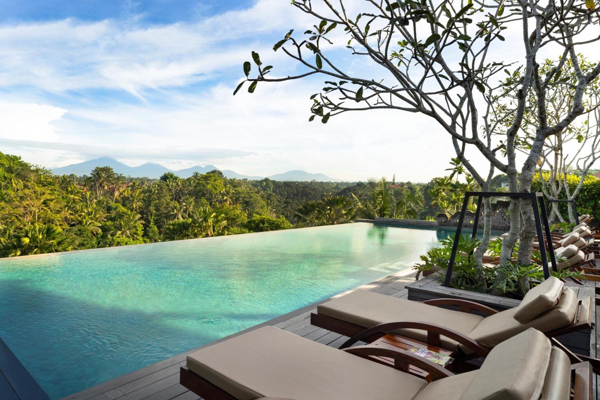 Adiwana Bisma Hotell Ubud Exteriör bild The pool at the Alila Manggis
